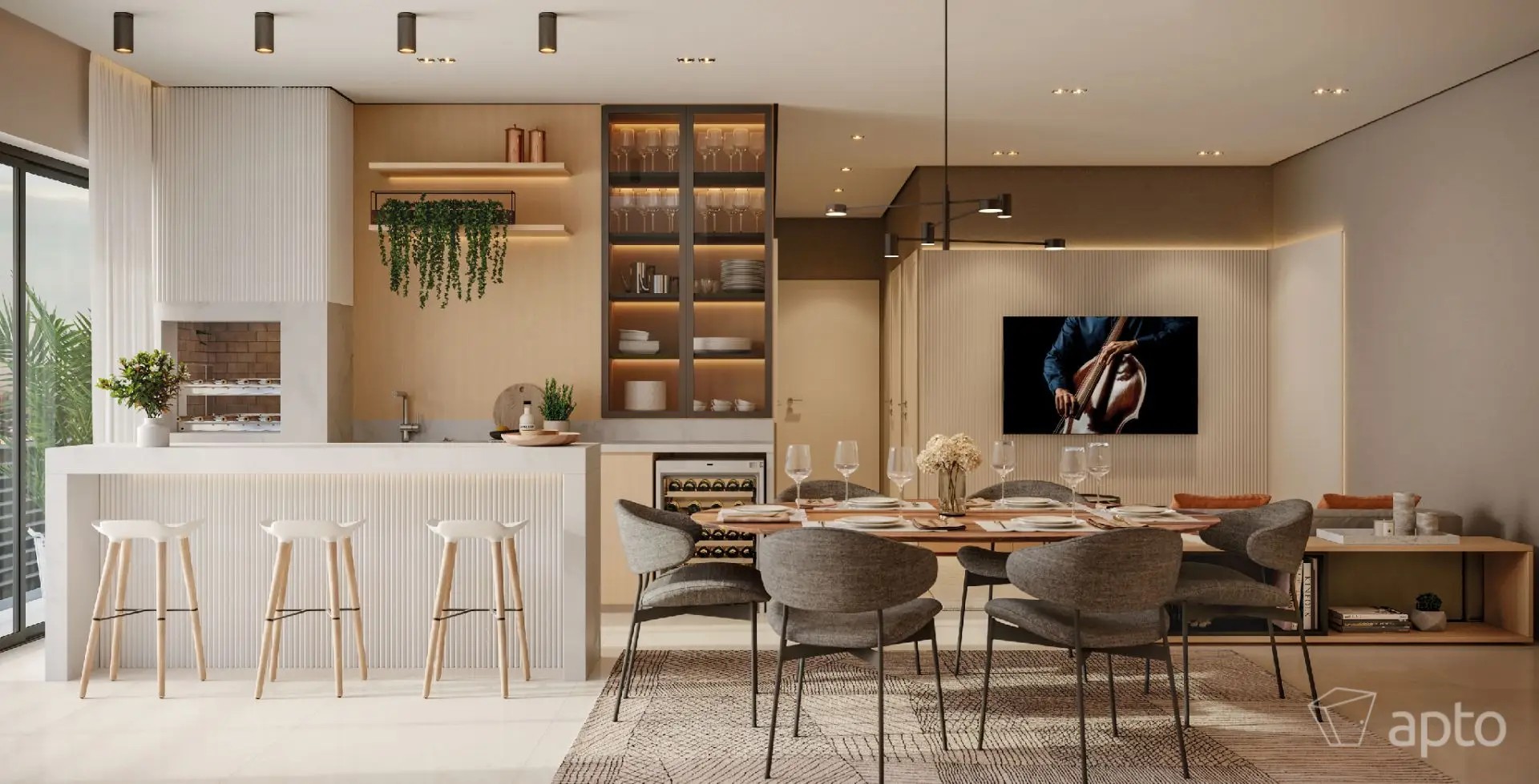 Espaço gourmet com bancada e mesa de jantar